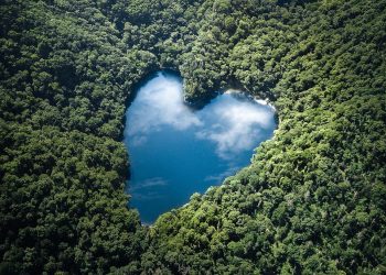 This rare heart-shaped body of water is Lake Toyoni in Hokkaido, Japan. Explaining how he felt when he took this picture, 38-year-old RK said: 'The sky was a clear blue over our hearts. Everyone felt a sensation of natural happiness'
