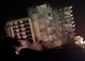 The part of the Champlain Towers South condominium building that was still standing was demolished late Sunday in Surfside, Fla.
