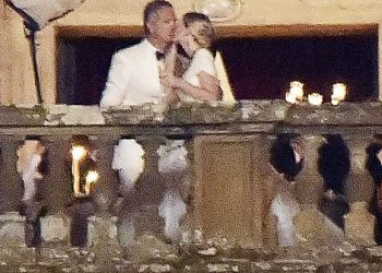 Lady Kitty could be seen sharing a kiss with her new husband Michael, a billionaire fashion tycoon, after the ceremony in Italy last night