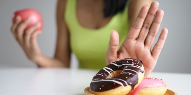 Women,Push,The,Donut,Plate,That,Is,A,Mixture,Of