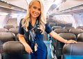 Caroline Skahn in her flight attendant uniform on a plane