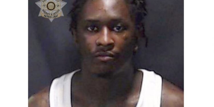 A mug shot of a Black male