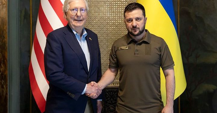 In this handout photo provided by the Ukrainian Presidential Press Office, Ukrainian President Volodymyr Zelenskyy and Senate Minority Leader Mitch McConnell, R-Ky., pose for a photo in Kyiv, Ukraine, Saturday, May 14, 2022. (Ukrainian Presidential Press Office via AP)
