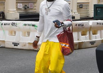 Image may contain Footwear Clothing Shoe Apparel Human Person Lil Uzi Vert Helmet Sleeve and Shorts