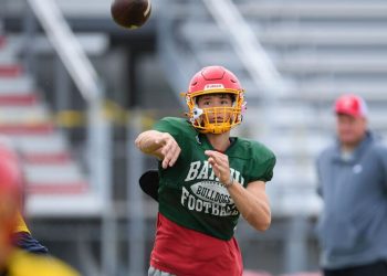 Batavia’s Ryan Boe passes the football during practice.