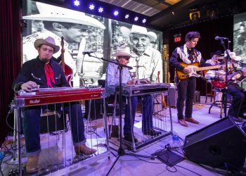 A band playing on a stage