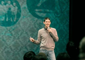 In this Jan. 3, 2010 photo, pastor Matt Chandler speaks to his congregation in Flower Mound, Texas for the first time following his brain surgery.