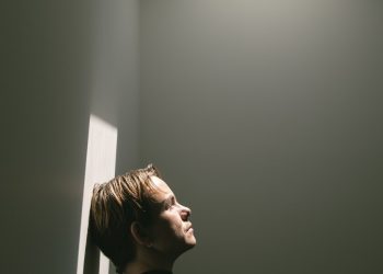 a man standing in a hallway