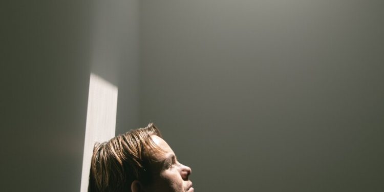 a man standing in a hallway