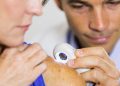 How can you tell if a spot is skin cancer