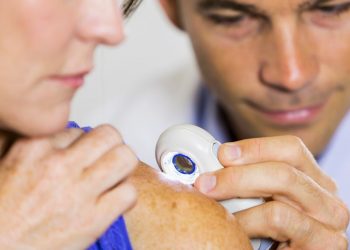 How can you tell if a spot is skin cancer