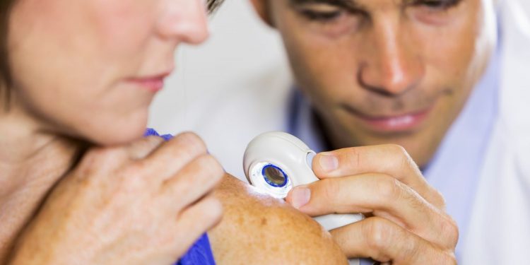 How can you tell if a spot is skin cancer